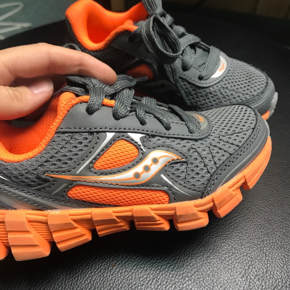 Boys size 10.5 Saucony, VERY gently used.